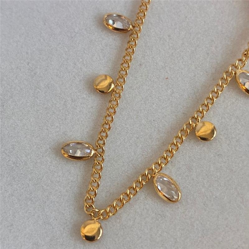 COLAR CHAPINHAS REDONDAS E ZIRCÔNIAS EM GOTA FOLHADO A OURO 18K