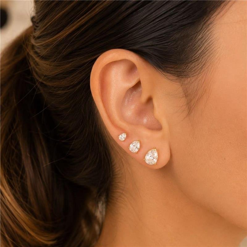 BRINCO TRIO DE PONTOS DE LUZ FOLHEADO A OURO 18K 