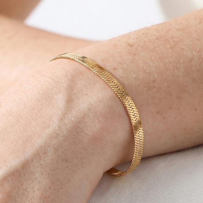 PULSEIRA TRANÇADA FOLHEADA A OURO 18K 