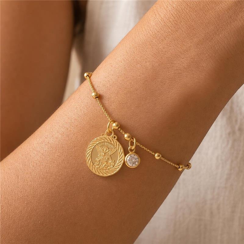 PULSEIRA ARCANJO COM PONTO DE LUZ FOLHEADO A OURO 18K 
