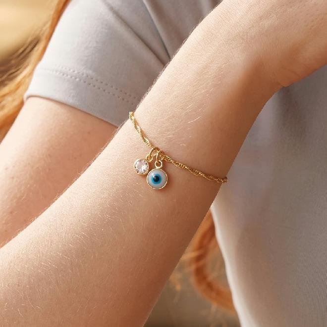 PULSEIRA OLHO GREGO COM PONTO DE LUZ FOLHEADO A OURO 18K 