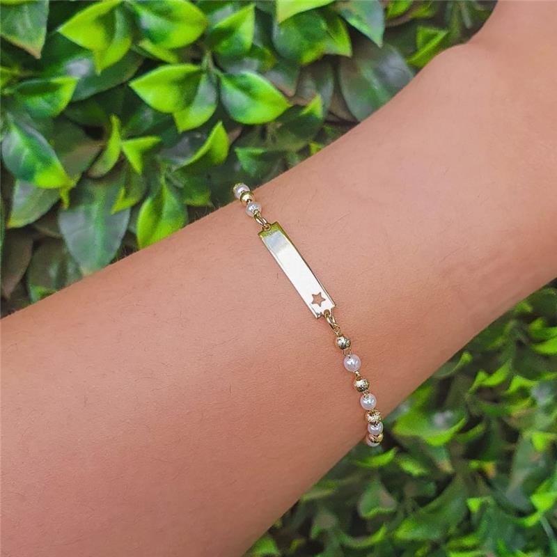 PULSEIRA INFANTIL COM BOLINHAS E PÉROLA COM CHAPINHA LISA E ESTRELA FOLHEADO A OURO 18K