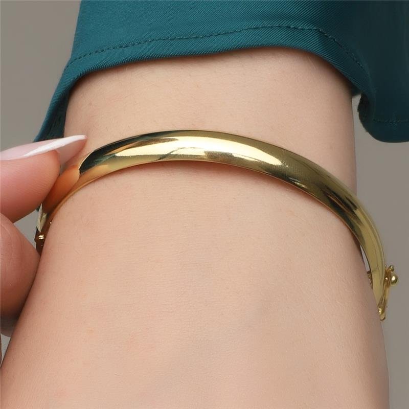 BRACELETE LISO COM PEGA LADRÃO FOLHEADO A OURO 18K